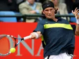 Duelo de amigos. El español Carlos Moyà en el partido disputado ante Rafa Nadal en primera ronda del Masters Series de Roma.