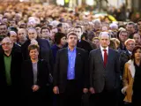 Juan Maria Atutxa, Kontxi Bilbao y Gorka Knorr, durante la manifestación. (REUTERS).