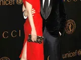 Tom Cruise y Katie Holmes, a su llegada al evento. La gala ha sido organizada por Madonna con el apoyo de Gucci, que afirma haber pagado el coste de la organización.