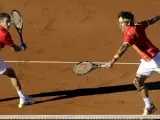 Robredo y Feliciano, en una imagen de archivo en un partido de dobles. (REUTERS)