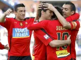 Jurado, del Mallorca, celebra la victoria junto a sus compañeros.