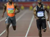 El atleta jamaicano Asafa Powell (i) y el estadounidense Tyson Gay (d), en la Golden Athletics Gala de Roma.
