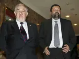 El fiscal general del Estado, Cándido Conde-Pumpido, acompañado del ministro de Justicia, Francisco Caamaño (dcha).