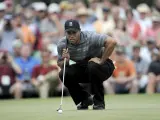 El jugador de golf estadounidense Tiger Woods participa en la primera ronda del Masters de Augusta.