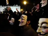 Protestantes contra la ley Sinde con máscaras de Guy Fawkes.