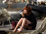 Una mujer llora en Natori, una ciudad de la provincia de Miyagi.