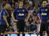 Los jugadores del Manchester United Anderson, Owen, Fletcher y Berbatov se lamentan tras el gol del Stoke City.