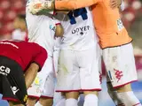 Los jugadores del Sporting de Gijón celebran la victoria ante el Real Mallorca.