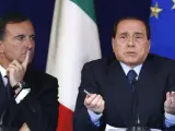El ministro de Exteriores italiano, Franco Frattini, y el primer ministro del país, Silvio Berlusconi.