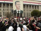 Seguidores del presidente sirio, Bachar al Asad, se concentraron el jueves en la plaza Sabe Bahrat de Damasco, Siria.