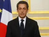El presidente de Francia, Nicolas Sarkozy, se dirige a los medios de comunicación durante una rueda celebrada en el Palacio del Elíseo en París este miércoles.