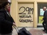 Pintada en Málaga anunciando la huelga general del 29-M.