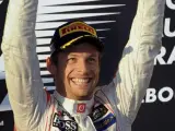 El piloto de McLaren, Jenson Button, celebra su victoria en el Gran Premio de Australia.