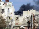Imagen de archivo de la ciudad siria de Homs durante uno de los bombardeos del régimen de Bachar al Asad.
