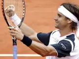 El tenista español David Ferrer celebra su victoria ante su compatriota Marcel Granollers.