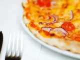 La pizza es un alimento altamente calórico, que se restringe en todas las dietas contra la obesidad .