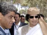 El dictador libio Muamar el Gadafi a la derecha, con su director de la inteligencia militar, Abdulá al Senusi.