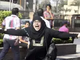 Una mujer gesticula en una de las manifestaciones desarrolladas en El Cairo.