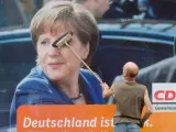 Cartel electoral alemán con Angela Merkel.