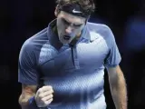 Roger Federer celebra su victoria ante el argentino Juan Martín del Potro en el Torneo de Maestros.
