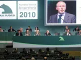 El presidente de Caja Madrid, Rodrigo Rato, intervirne durante una asamblea extraordinaria de la entidad madrileña.