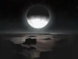 Recreación artística de la cara nocturna de Plutón, iluminada por su luna Caronte.