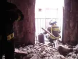 Interior de una vivienda en la travesía de Las Beatas de Madrid, donde se ha producido un incendio.