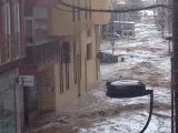 Las calles de la localidad de Adra (Almería), anegadas tras una gran tromba de agua.