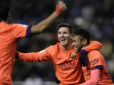 Luis Suárez, Leo Messi y Neymar celebran un gol esta temporada.