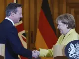 La canciller alemana Angela Merkel junto al exprimer ministro David Cameron, quien la telefoneó justo antes del 'brexit' para lograr concesiones en inmigración.