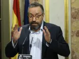 El portavoz de Ciudadanos en el Congreso, Juan Carlos Girauta en su comparecencia ante los medios de comunicación para valorar el discurso de investidura del presidente del Gobierno en funciones, Mariano Rajoy.