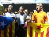 El expresidente de la Generalitat Artur Mas (centro) y el exconseller Francesc Homs (izqda) en un acto en el municipio de Arenys de Munt.