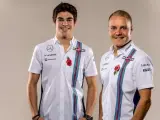 Los pilotos del equipo Williams para 2017: el canadiense Lance Stroll y el finlandés Valtteri Bottas.