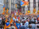 Banderas esteladas en una concentración en Barcelona a favor de Artur Mas y la independencia de Cataluña.