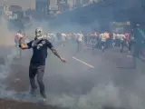 Disturbios entre manifestantes y Policía en Venezuela.