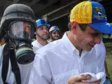 El líder opositor, Henrique Capriles, herido en un manifestación en Caracas (Venezuela).