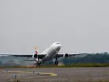 Un avión de Iberia, en la T4 del aeropuerto Adolfo Suárez Madrid-Barajas.