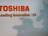 A Toshiba logo is seen during a press conference a