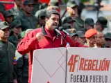 Venezuelan President Nicolas Maduro delivers a spe