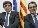 Los expresidentes de la Generalitat Carles Puigdemont y Artur Mas, en una imagen de archivo.