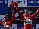 Michael Schumacher y Rubens Barrichello, en su etapa como compañeros en Ferrari.