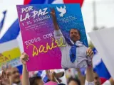 Participantes en una marcha en apoyo al Gobierno de Daniel Ortega, en Managua (Nicaragua).