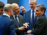 El ministro de Finanzas alemán, Olaf Scholz; el comisario europeo de Asuntos Económicos, Pierre Moscovici; el ministro francés Bruno Le Maire y el griego Euclid Tsakalotos