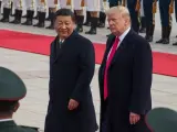 El presidente chino Xi Jinping y el presidente de EE UU Donald Trump en la visita de este último a China el año pasado.