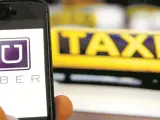 Uber y el taxi, un choque pendiente de solución. EFE