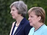 La canciller alemana, Angela Merkel, junto a la primer ministra británica, Theresa May.