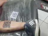 Tatuaje de un hincha de River con el enlace a un vídeo de YouTube que luego fue eliminado.