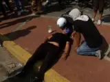 Una joven, de 27 años, es la segunda víctima mortal en Venezuela tras recibir un disparo en la cabeza en las masivas protestas contra Nicolás Maduro de este Primero de Mayo que ha dejado más de medio centenar de heridos.