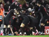 Los jugadores del Atlético celebran uno de sus goles ante el Liverpool