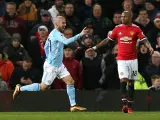 David Silva celebra un gol en un Manchester City - United.